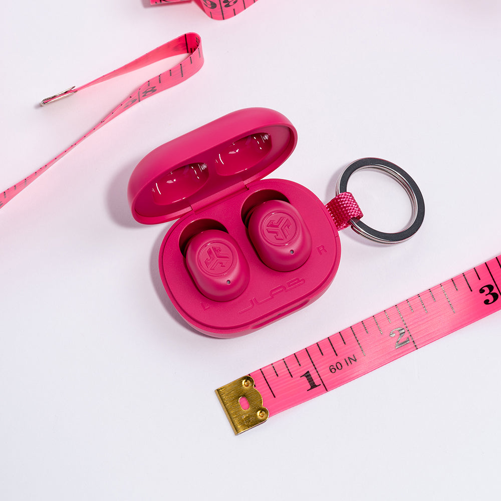 Fitness Accesories, Headphones And Measure Tape On Pink Background