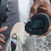 Rinsing Flex Sport Headphone Earcups Under Faucet